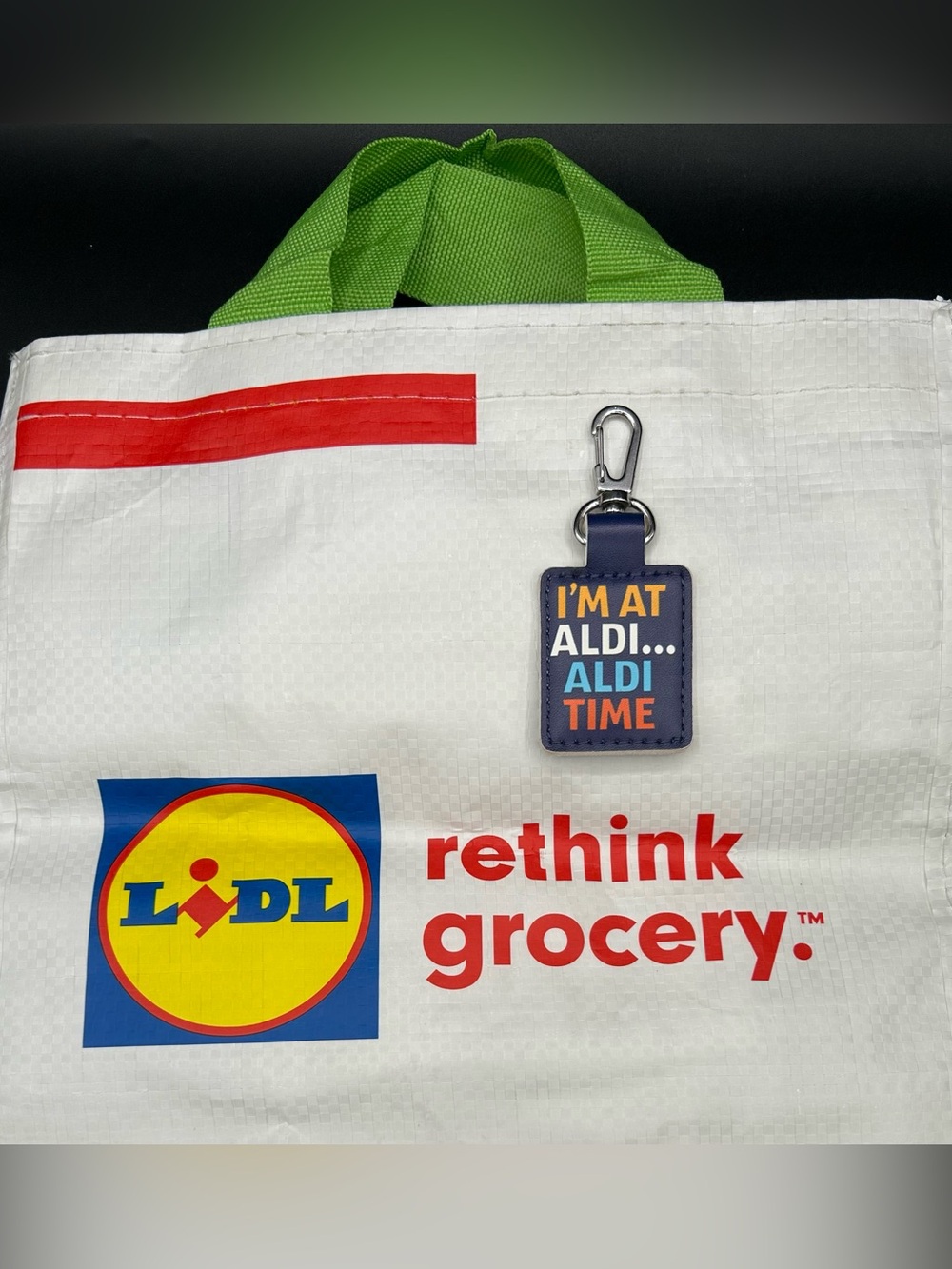 ALDI Quarter Holder Keychain and reusable bag.